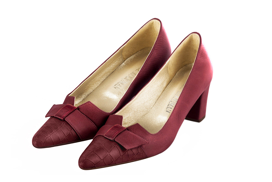 French elegance and refinement for these burgundy red dress pumps, with a knot on the front, 
                available in many subtle leather and colour combinations. Possibility to customize with your colors and materials.
With its original cutout, this pretty fitted pump
will render you great services, combining comfort and distinction. 
                Matching clutches for parties, ceremonies and weddings.   
                You can customize these shoes to perfectly match your tastes or needs, and have a unique model.  
                Choice of leathers, colours, knots and heels. 
                Wide range of materials and shades carefully chosen.  
                Rich collection of flat, low, mid and high heels.  
                Small and large shoe sizes - Florence KOOIJMAN